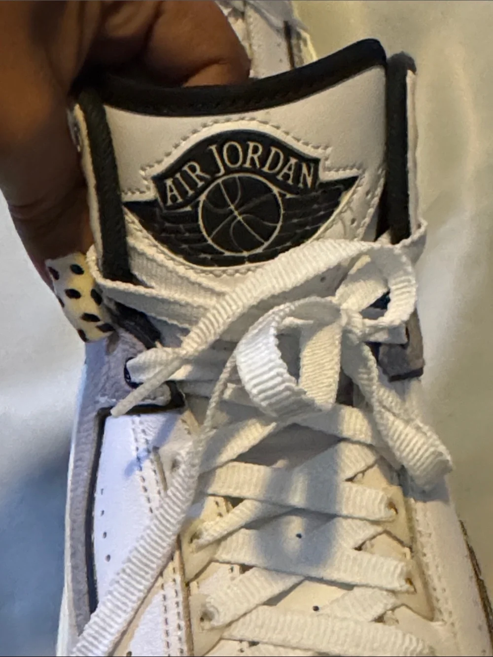 Jordan men White and Black Mid-Top Sneakers